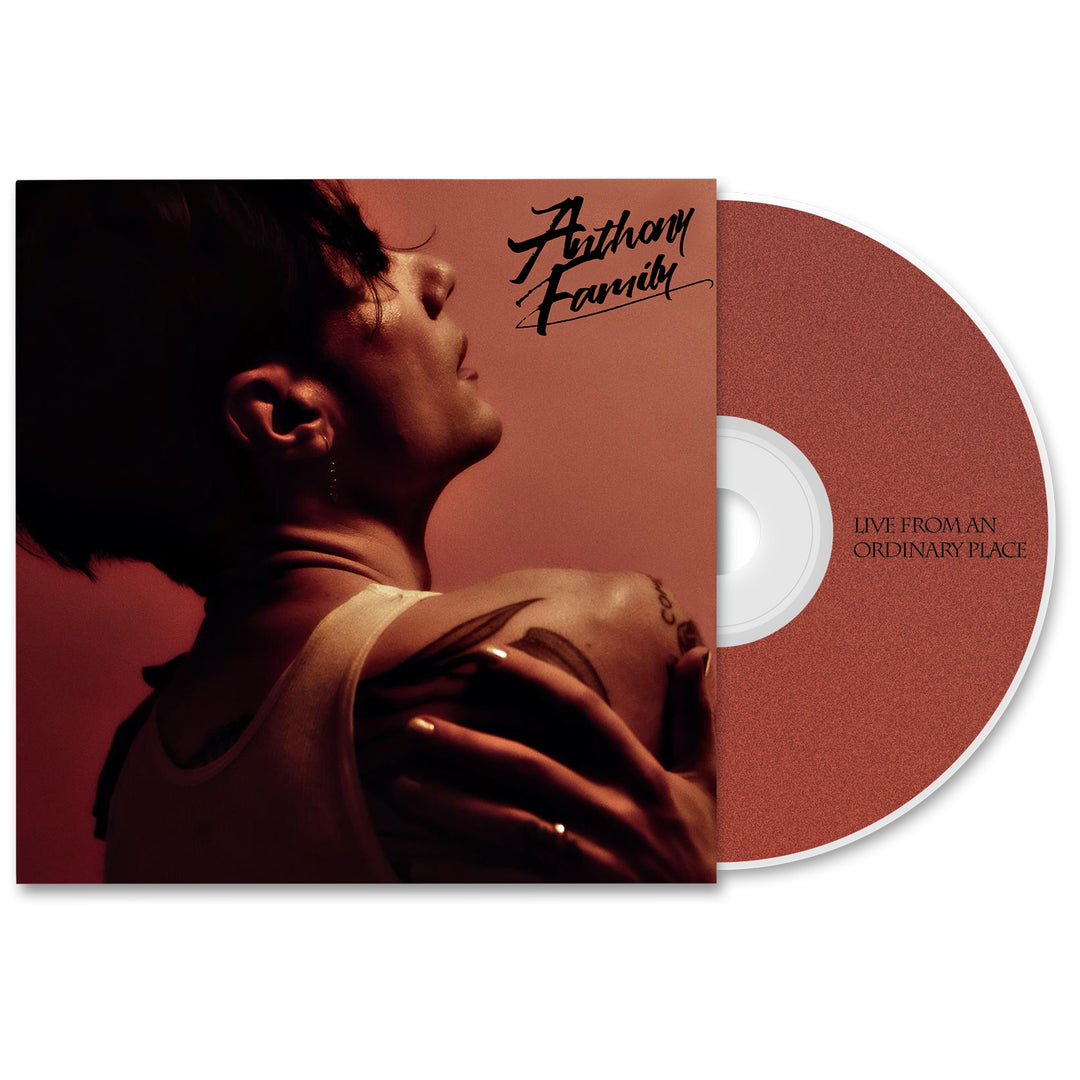 Anthony Family’s Live From An Ordinary Place CD features a tattooed person in profile under red lighting on the cover, with the disc partly visible beside it—ideal for fans excited about the Anthony Family album presale.