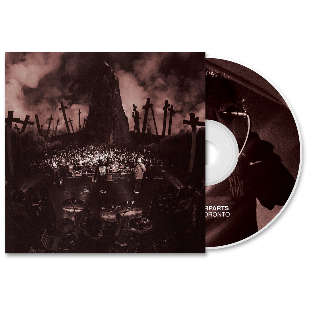A Counterparts Live In Toronto CD with a partially open cover shows a sepia band on stage before a massive crowd, dramatic clouds, and crosses. Presale available now; album releases July 30th, 2024.