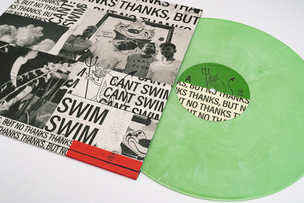 A translucent light green “Mint Galaxy” vinyl LP by Can’t Swim, partially out of its black, white, and red sleeve with people photos, cartoon illustrations, and repeated text: CANT SWIM. THANKS, BUT NO THANKS. SWIM.
