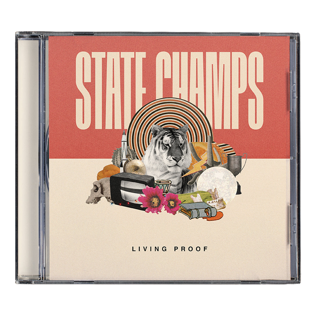 CD cover for Living Proof by State Champs, featuring a black and white tiger surrounded by objects, flowers, abstract shapes on a red and beige background. Includes the album’s full tracklisting. Brand: State Champs.