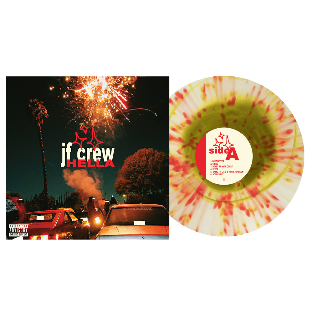 Album cover for Hella by Just Friends, featuring fireworks lighting up the night sky above cars and people. Next to it is a Vinyl LP with a white base, green and red splatter (Side A)—ideal for any indie retail album display.