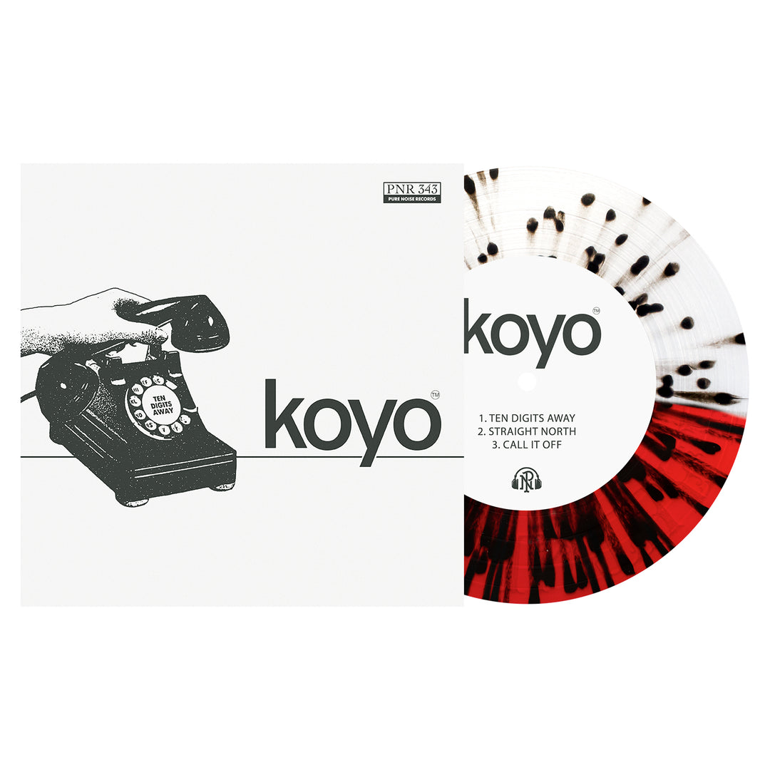 A KOYO vinyl record with a white base and black/red splatter is partly out of its sleeve, which has a rotary phone drawing, the name koyo, and the tracklist: TEN DIGITS AWAY, STRAIGHT NORTH, CALL IT OFF.