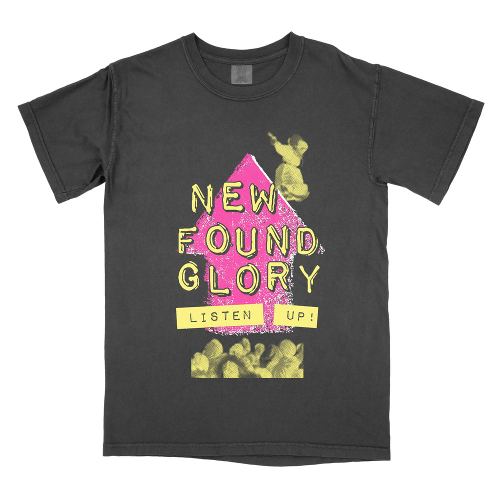 Black New Found Glory T-shirt featuring a large pink arrow, yellow "NEW FOUND GLORY" text, and "LISTEN UP!" at the bottom, with faded yellow images of people jumping—great for showing your love for the band.