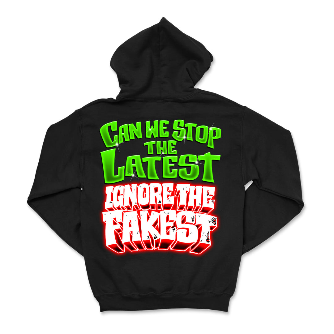 A black printed sweatshirt from UNITYTX features bold text on the back—CAN WE STOP THE LATEST IGNORE THE FAKEST—in green, white, and red lettering. Make a statement and stand out with this unique custom apparel.