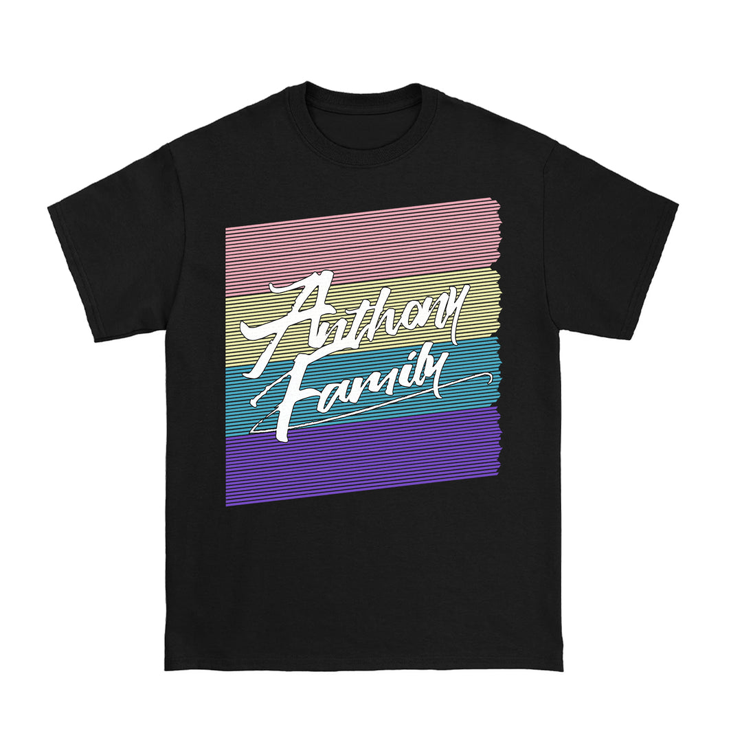 Black T-shirt with a stylized brushstroke background in pink, red, orange, yellow, green, blue, and purple, featuring the words “Anthony Family” in bold white script across the front.