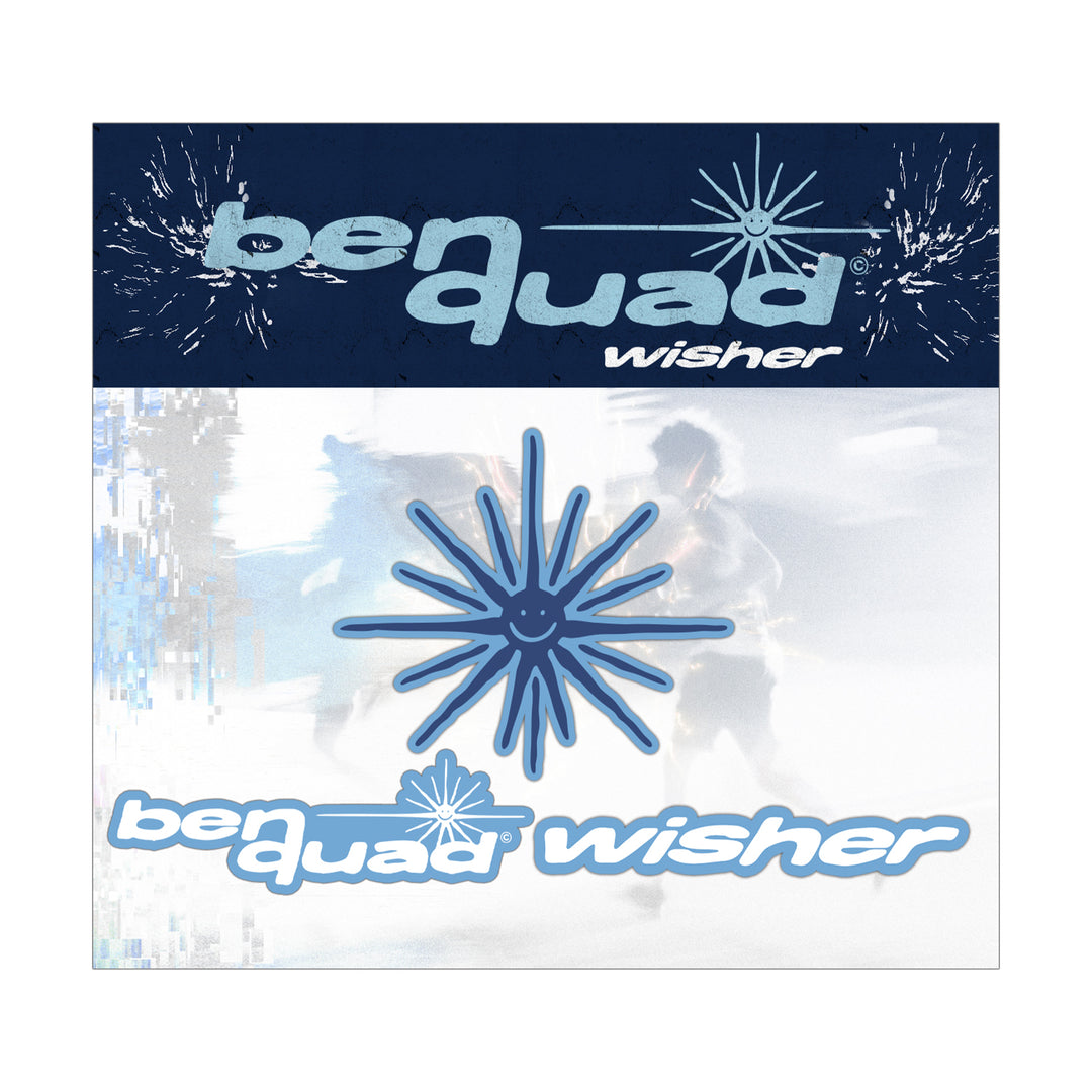 Ben Quad album cover with ben quad Wisher text in blue and white, a big blue starburst Croc-charm-style smiling face at the center, and a blurred background showing two indistinct figures.