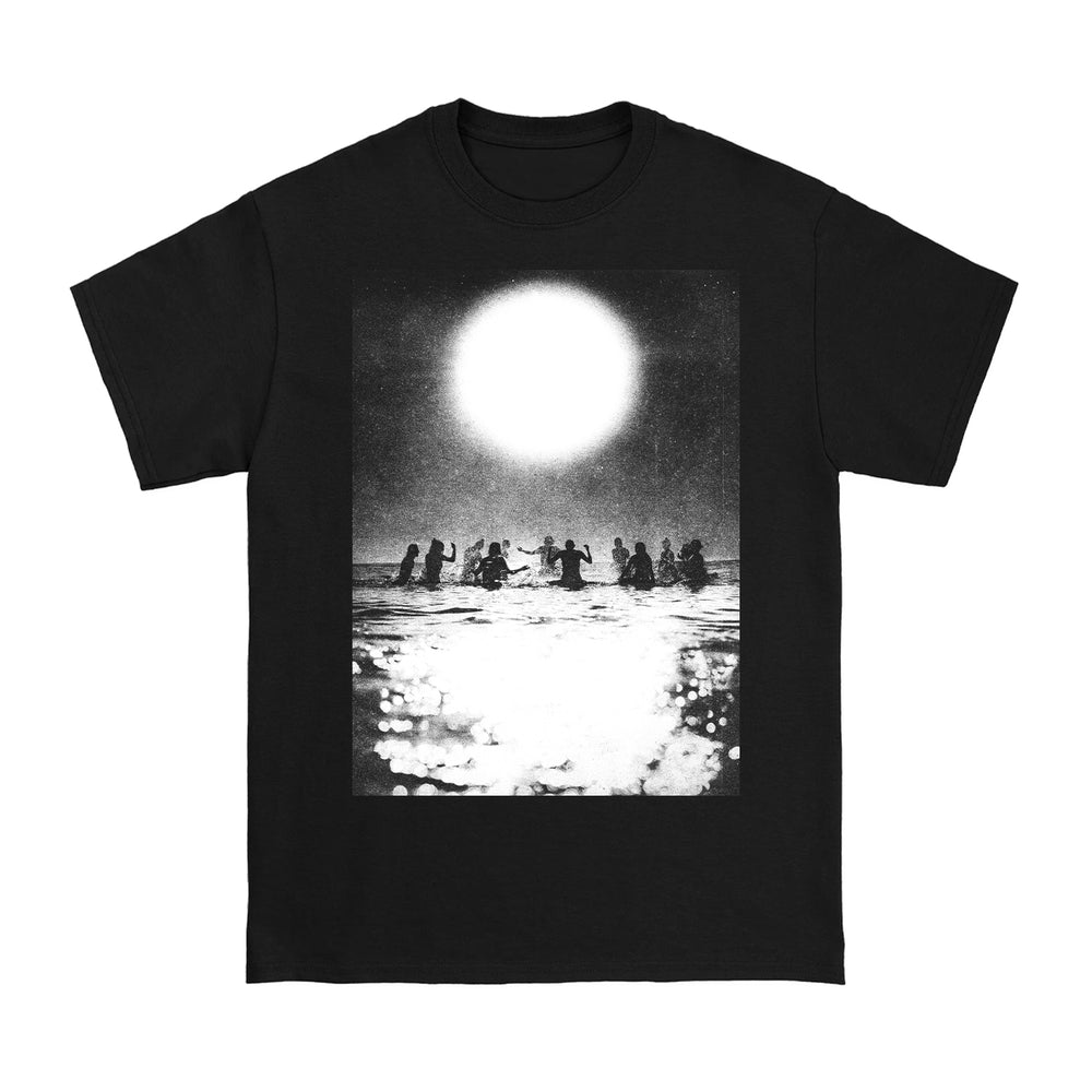 Seahaven black cotton t-shirt featuring a black-and-white print of people standing in water under a bright sun or moon, with striking reflections. A standout printed tee known for its bold, eye-catching design.