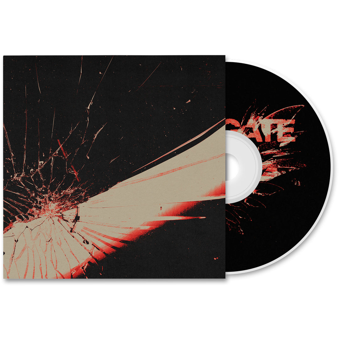 A CD partially slid out of a black Heavensgate case with a red and beige cracked glass design, displaying bold, partially obscured white and red text on the CD—echoing the heavy white splatter on exclusive Angel Hymns vinyl editions.