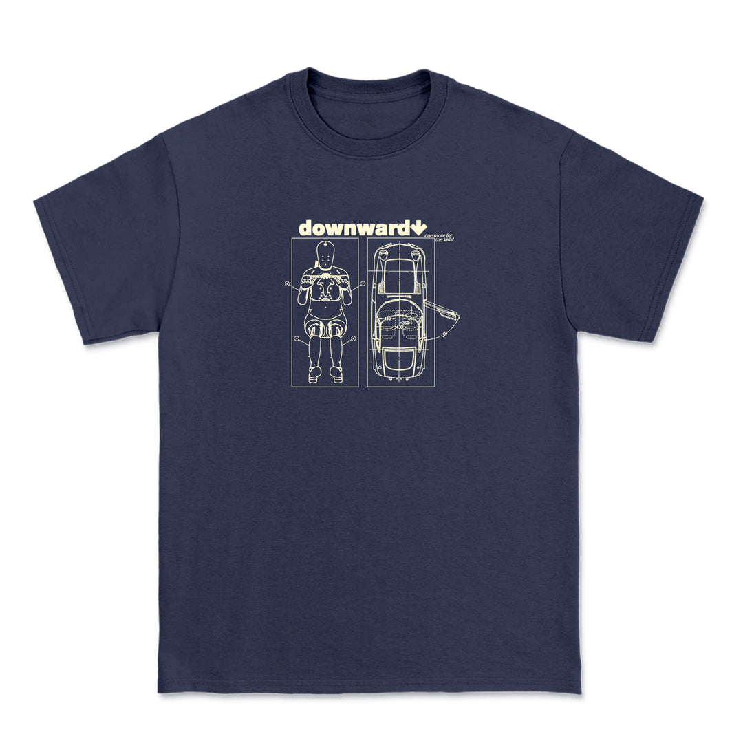 Navy blue Comfort Colors t-shirt by DOWNWARD with a white line art of a masked wrestler lying beside a classic car, “downward” in bold above the design.
