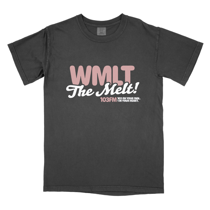 A black Alex Melton Heavy T-shirt featuring "WMLT The Melt! 103FM 103 on your dial, in your heart." in bold pink and white retro-style lettering printed on the front.