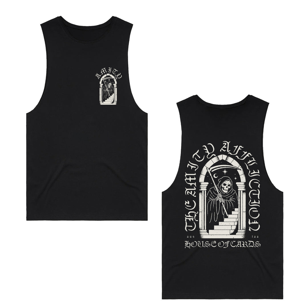 Black sleeveless t-shirt by The Amity Affliction featuring a white grim reaper graphic in an arched doorway on front and back, with bold “THE AMITY AFFLICTION” and “HOUSE OF CARDS” text, printed on quality Gildan apparel.