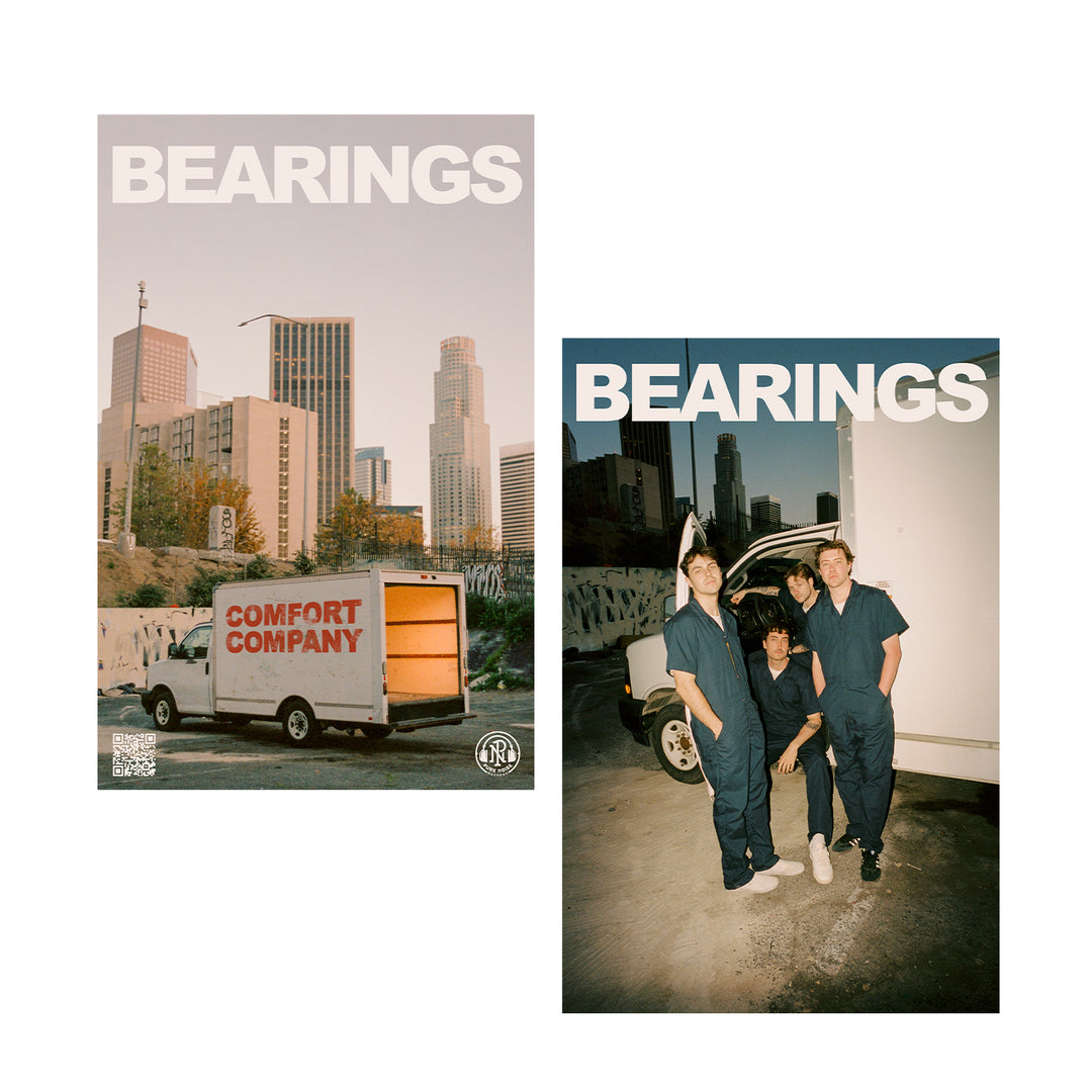 Two Bearings posters: one shows their van labeled Comfort Company against a city skyline; the other features all four band members in blue jumpsuits smiling in front of the same van.