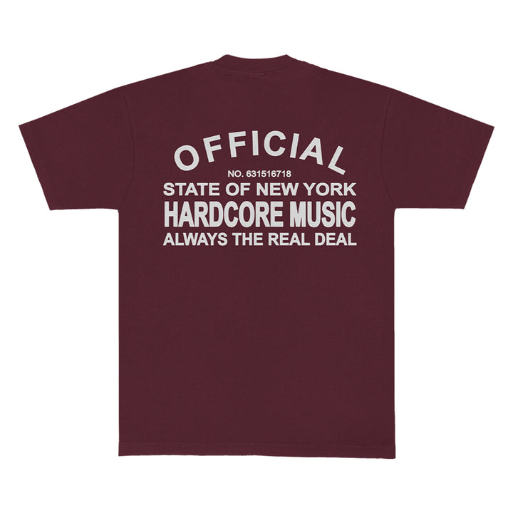 A maroon KOYO T-shirt with bold white text on the back: OFFICIAL STATE OF NEW YORK HARDCORE MUSIC ALWAYS THE REAL DEAL NO. 631516718—perfect for standout style and a zero-emissions wardrobe.