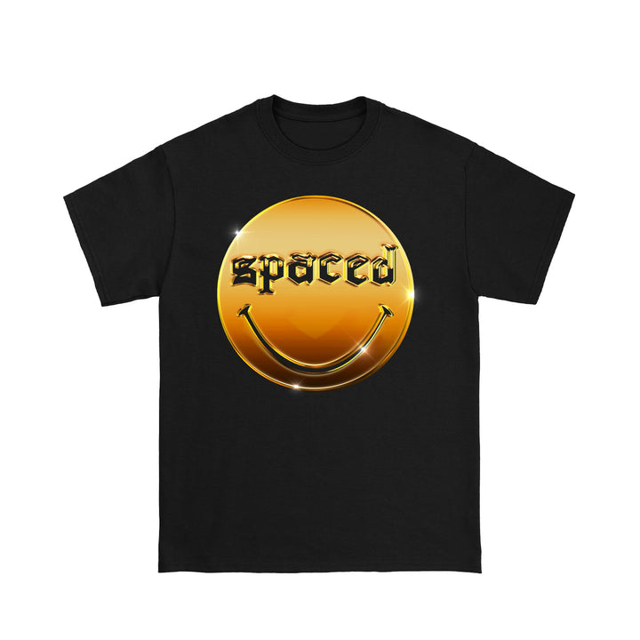 The Spaced Black T-shirt showcases a large gold smiley face with sparkling highlights and spaced in a metallic font across the forehead, blending the smile into the design.