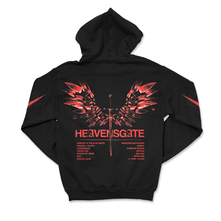 Heavensgate black hoodie featuring a red wings and sword graphic on the back, bold red "HEAVENSGATE" and "ANGEL HYMNS" lettering, plus a list of song titles or phrases below in smaller red text.