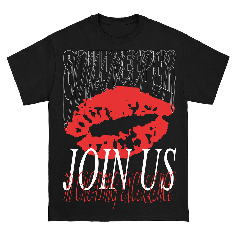 A black Soulkeeper Heavy t-shirt with a large red lip print, warped white “SONGKEEPER” text at the top, bold white “JOIN US” below, and small red cursive accents on soft heavy cotton.