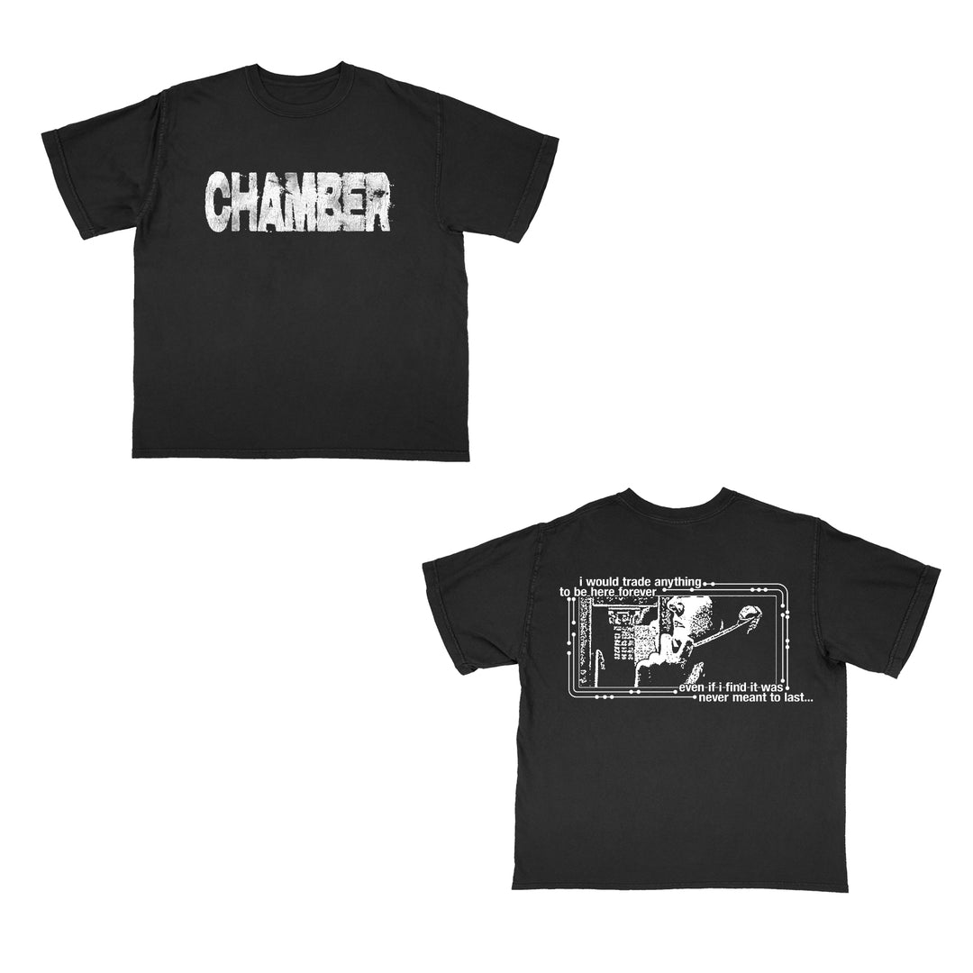Chamber Comfort Colors black tee with "CHAMBER" in bold, distressed white print on front. Back shows a graphic of text and a hand holding a flower above an upward-reaching skeletal hand.