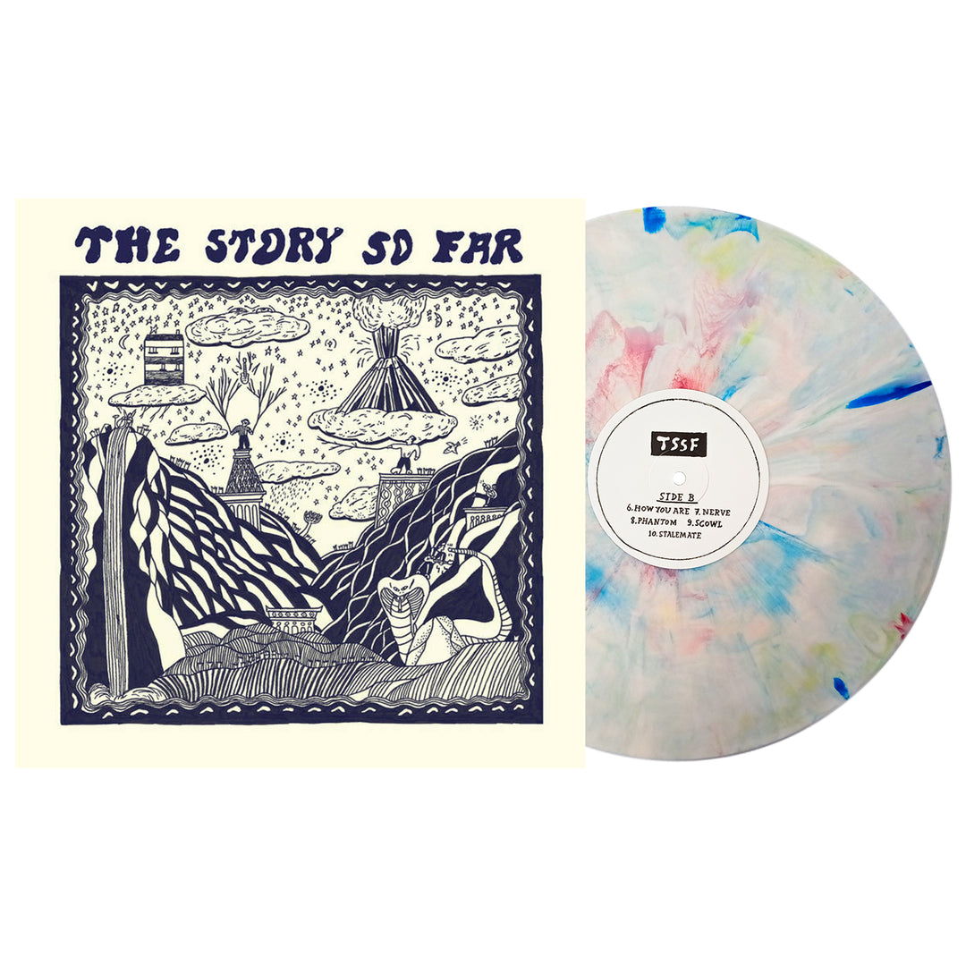 A Crayon Marble vinyl with a white base and pastel splatters sits beside The Story So Far album’s 10th Press cover, which showcases abstract blue and white mountains, clouds, and surreal artwork.