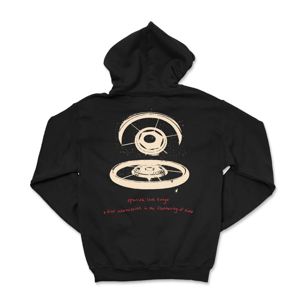 Spanish Love Songs black hoodie with a beige abstract circular design on the back and red handwritten text below: "spanish love songs a brief intersection in the functioning of time.