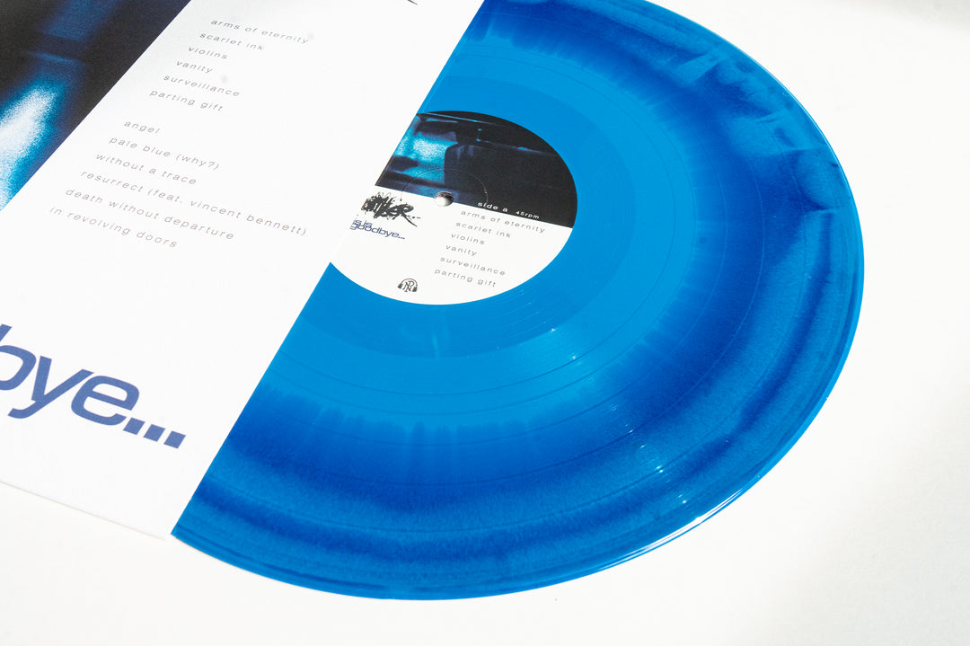 A translucent Blue Purple Aside Bside Vinyl LP by Chamber peeks from its white and blue sleeve, revealing the song list on the cover and Chamber’s label at the center.