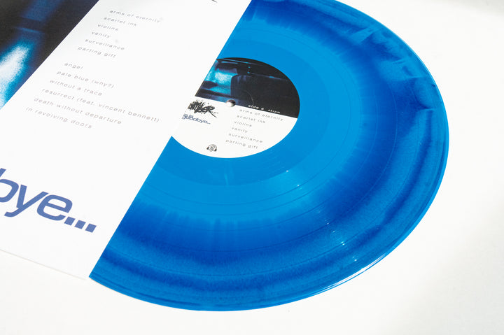 A translucent Blue Purple Aside Bside Vinyl LP by Chamber peeks from its white and blue sleeve, revealing the song list on the cover and Chamber’s label at the center.