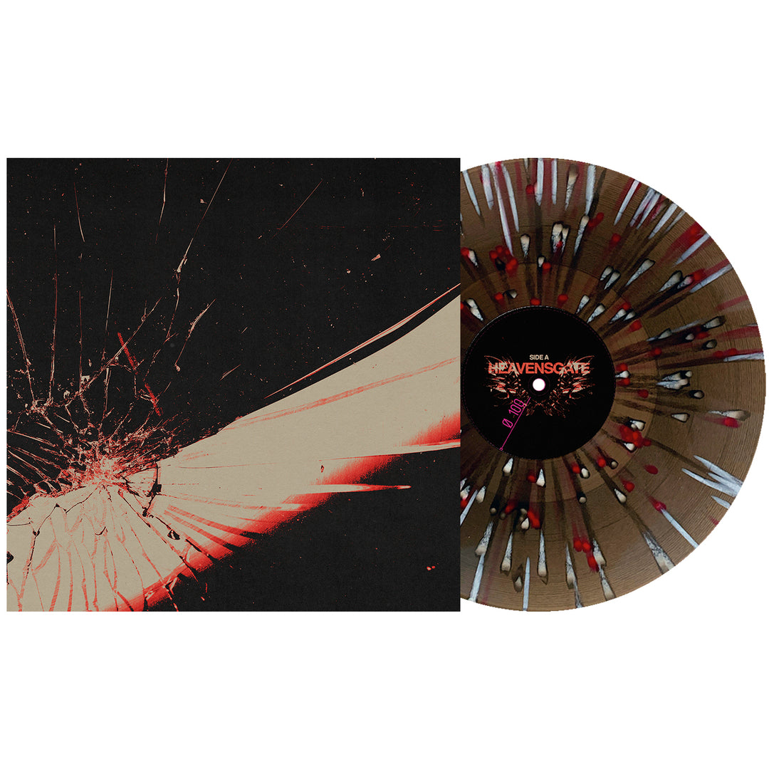 A Black Ice White Red Splatter vinyl record from Heavensgate sits partially in a sleeve with shattered glass abstract art in red and beige, making this Angel Hymns release a striking addition to any collection.