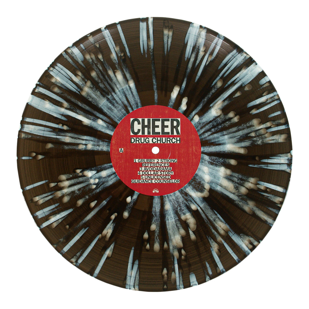 A limited edition vinyl from Drug Church with a Black Ice base, bold white splatter, and a red center label displaying CHEER and DRUG CHURCH, plus crisp white track listings.