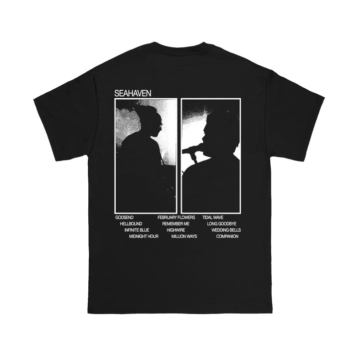 Seahaven black printed t-shirt featuring white graphics of two singer silhouettes at microphones, the Seahaven brand name above, and a list of song titles below. Ideal for fans of oversized box and cotton t-shirts.