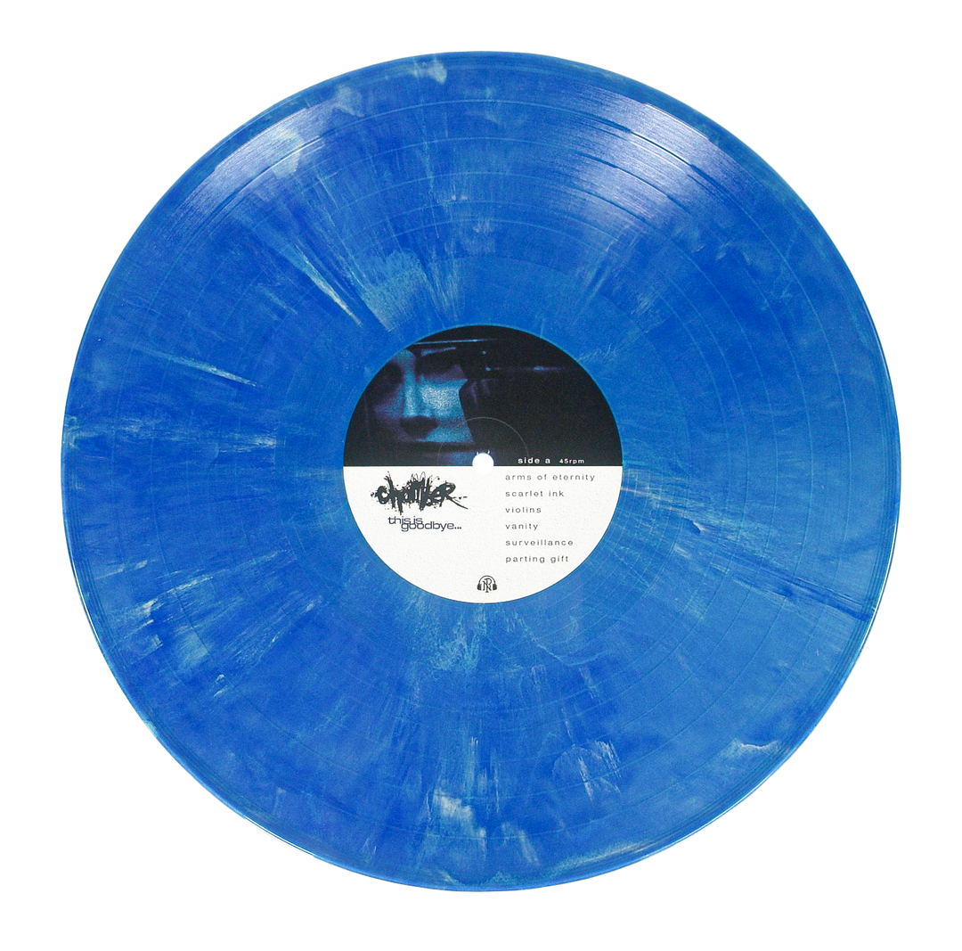 A metallic blue marble vinyl record with a center label listing side A tracks including Arms of Eternity, Scarlet Ink, and Violins.