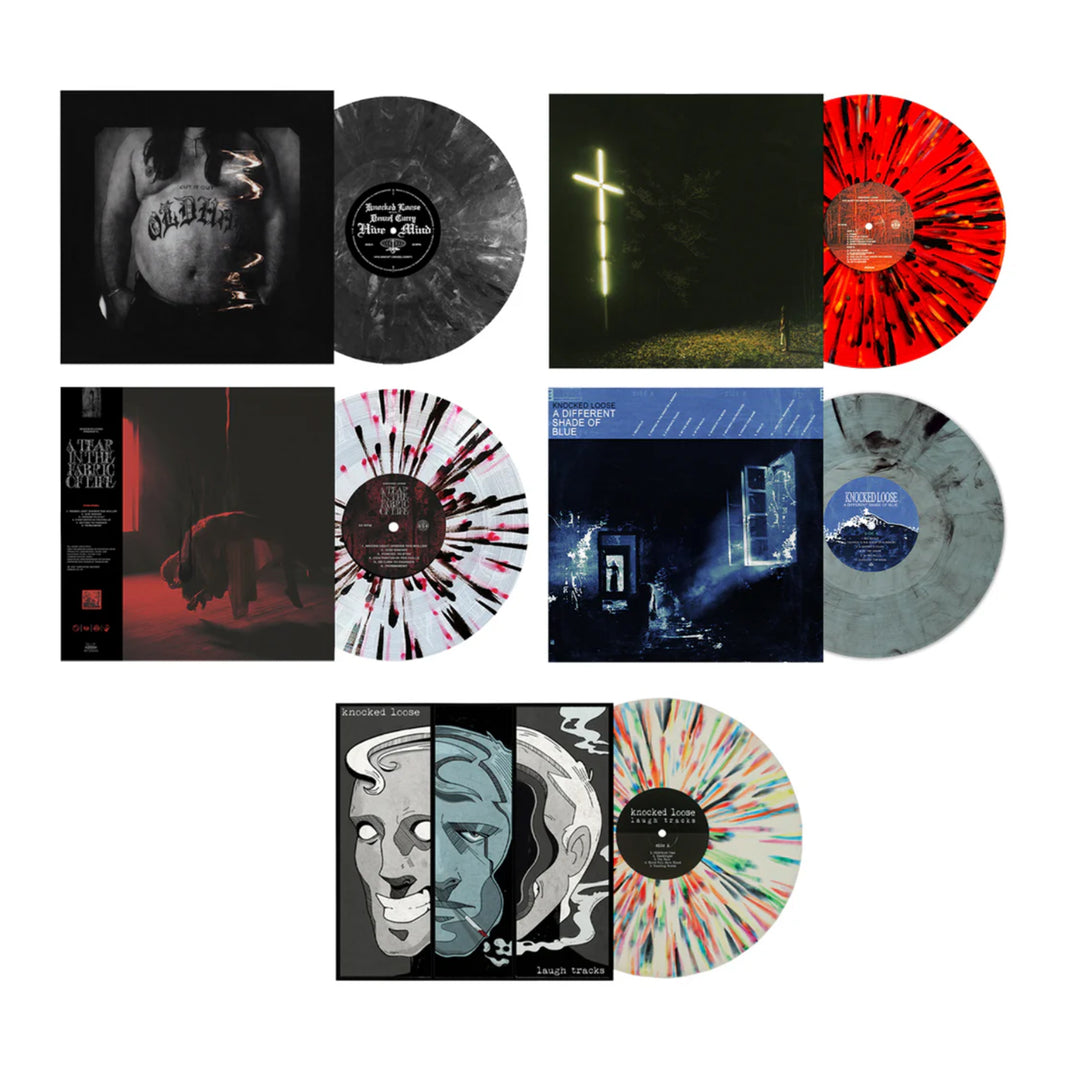 A set of six Knocked Loose vinyl records, featuring Hive Mind and A Tear In The Fabric Of Life, each with unique splatter designs and moody album covers showcasing crosses, windows, shadowy faces, and figures.
