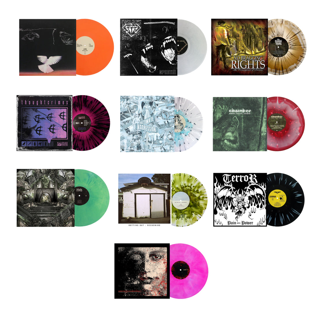 A grid of ten colored vinyl records from Pure Noise Records Merch, each with its album cover featuring dark or gothic art. This limited edition bundle includes orange, clear, marbled, green, red, black, and pink variants.