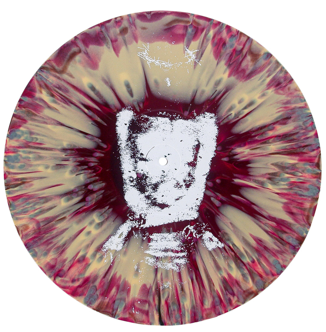 A colored splatter vinyl record from Vomit Forth, showcasing a marbled pattern of red, yellow, and purple with a striking white abstract face design in the center—ideal for collectors of the Born King album or anyone looking for a unique presale vinyl LP.