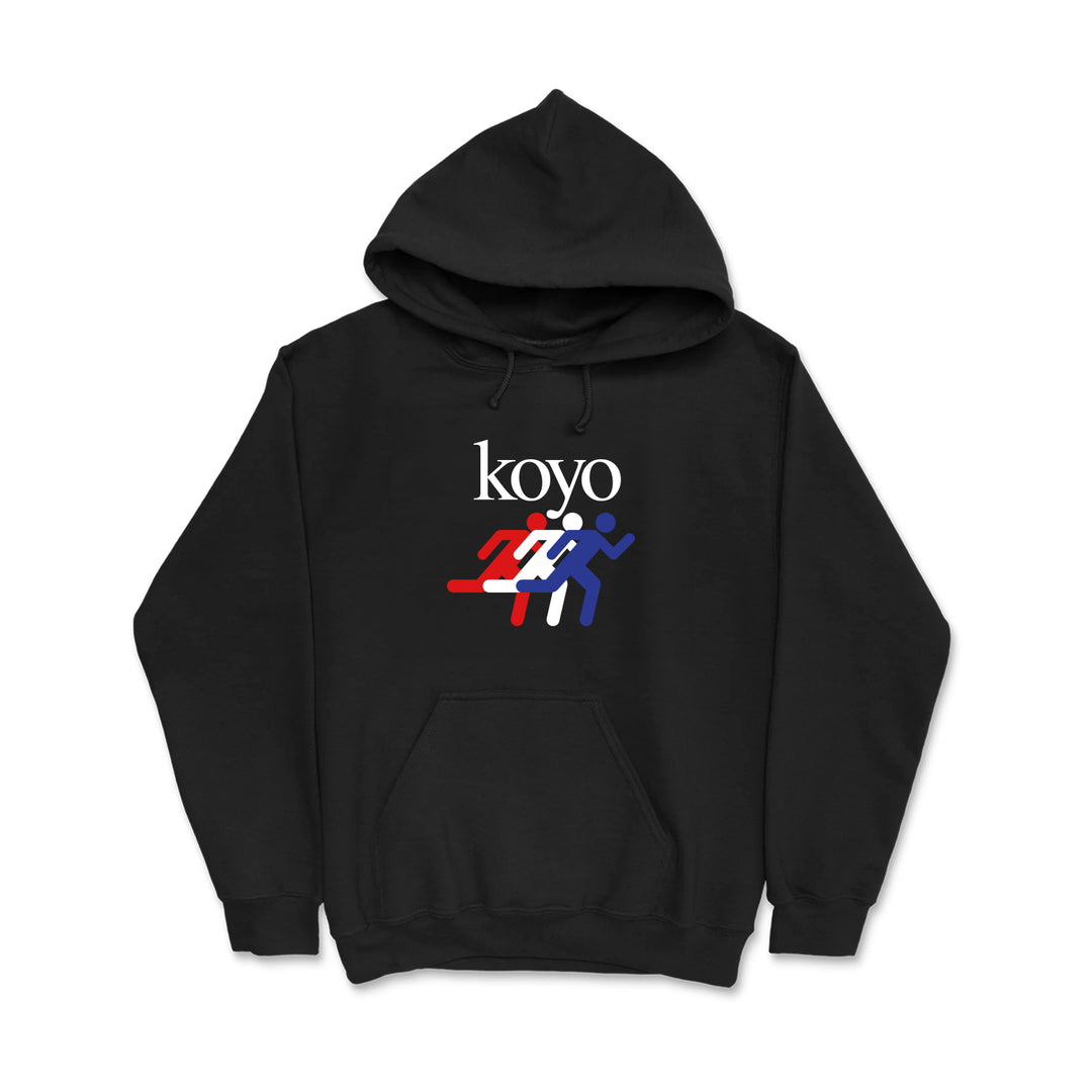 KOYO black hoodie with "KOYO" above three stylized running figures in red, white, and blue on the front. Features a front pocket and drawstrings.