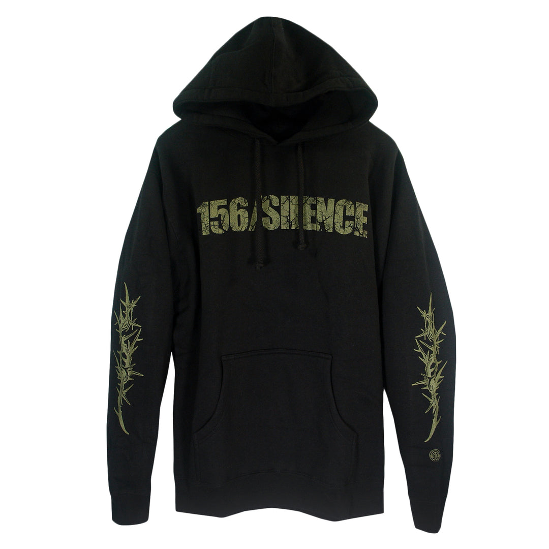 The 156/Silence black heavyweight pullover hoodie features distressed yellow-green "156/Silence" chest lettering, thorny branch sleeve designs, a fleece-lined hood, front pocket, drawstrings, and is made from soft ring-spun cotton.