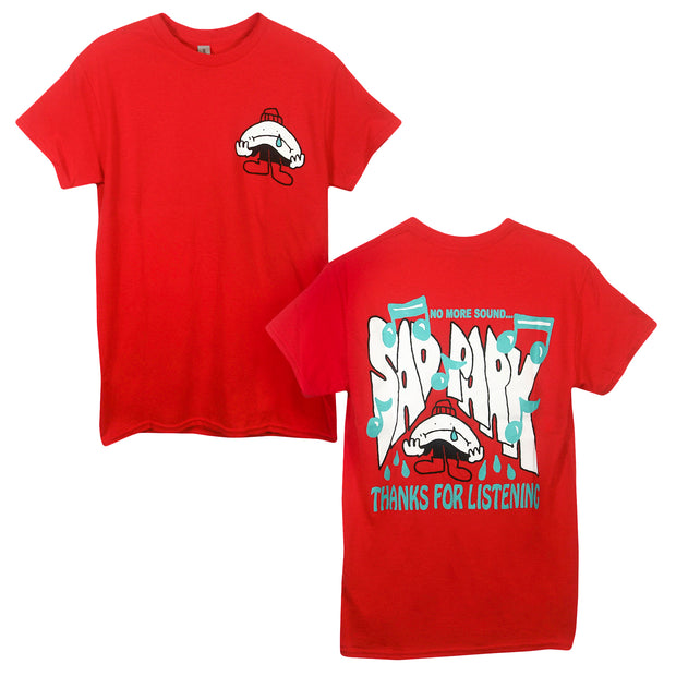 image of the front and back of a red tee shirt on a white background. front is on the left and has a small right chest print of a sad face. the back is on the right and has a full back print that says no more sound... sad park, thanks for listening, with a sad face and music notes