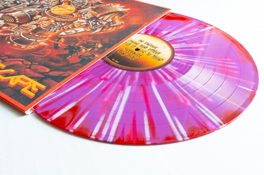 A purple & red splatter vinyl from Spaced is partially out of its colorful sleeve on a white surface. The No Escape album presale adds vibrant color and unique style to any collector’s vinyl collection.