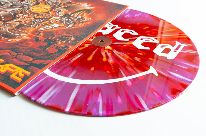 A Spaced "No Escape" vinyl, featuring a vibrant purple & red splatter and striking fantasy artwork on the sleeve, slides out to reveal bold white lettering—a standout for collectors and essential for album presale fans.