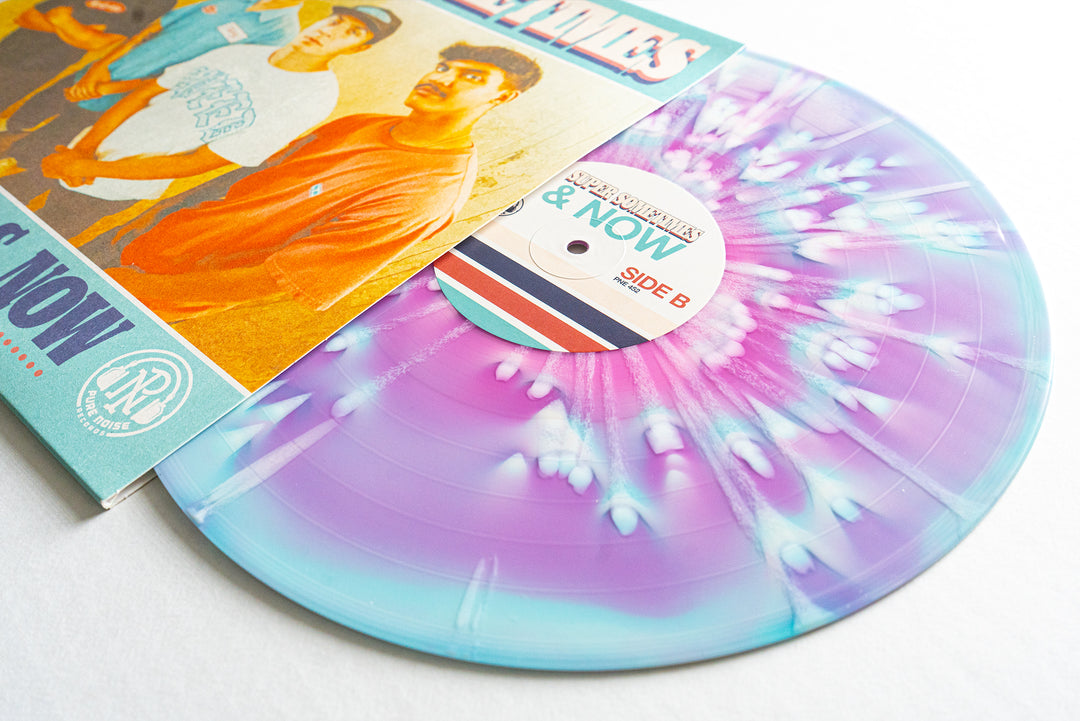 A purple and blue splatter vinyl record by Super Sometimes partially slides from a vibrant cover with three people and "AND NOW!" text—an ideal collectible for fans of the From Then & Now presale.