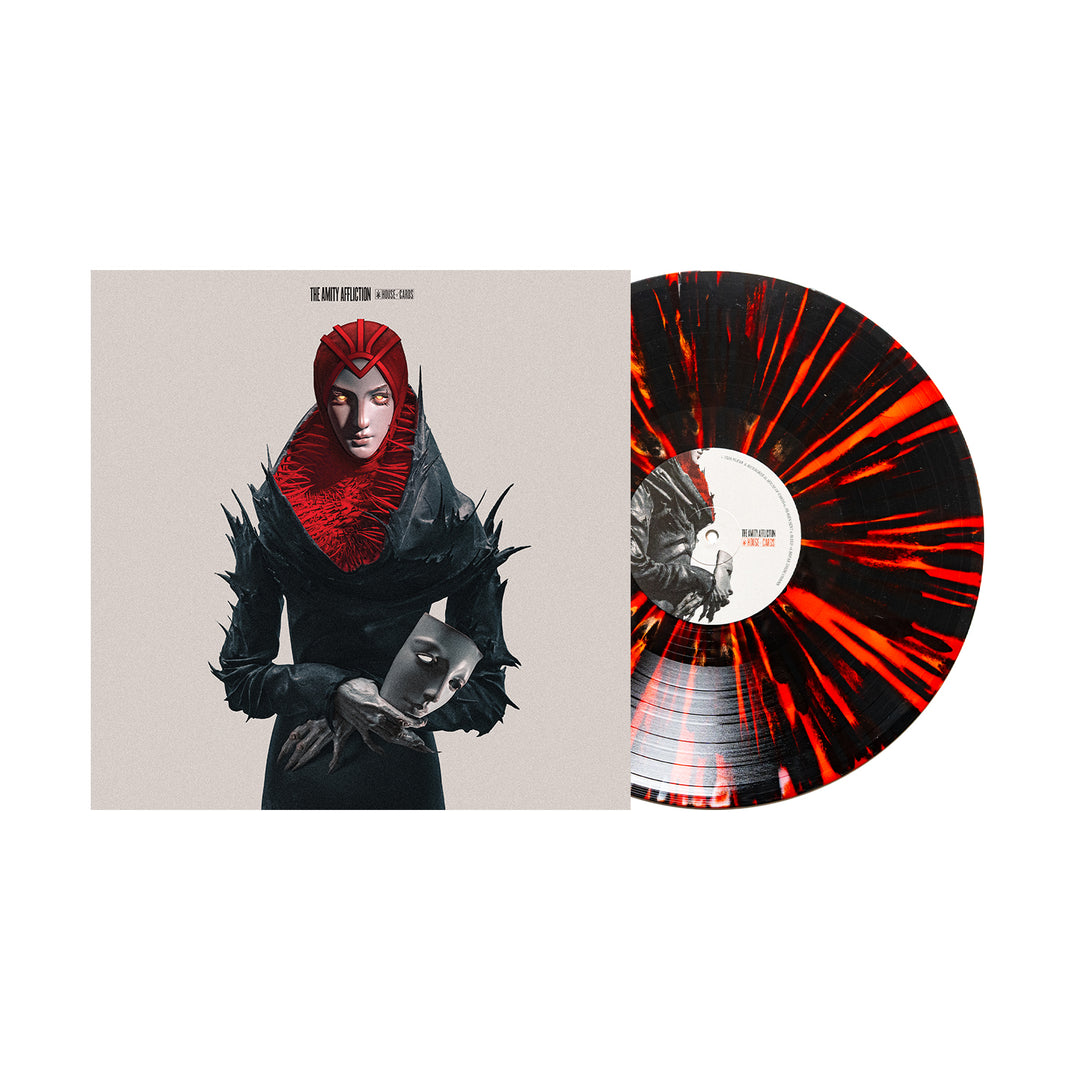 The Amity Affliction House Of Cards vinyl edition features an Amity Exclusive Blood Red & White splatter record beside its cover, showing a figure in a spiked black outfit and red headpiece holding a mask-like face against a plain background.