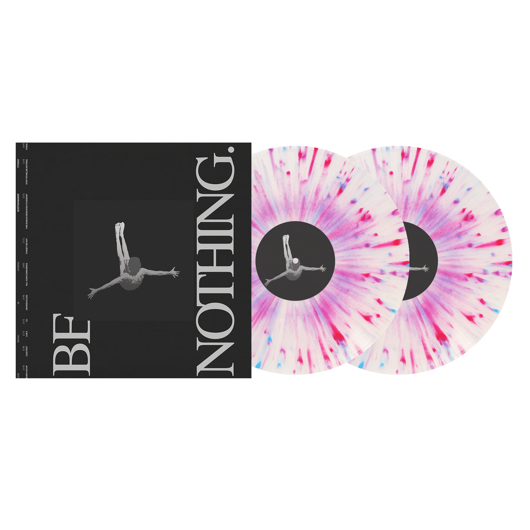 A Boston Manor Be Nothing vinyl album with a black cover showing a grayscale diver and bold BE NOTHING text, alongside two white vinyl records with pink, purple, and blue splatter designs.