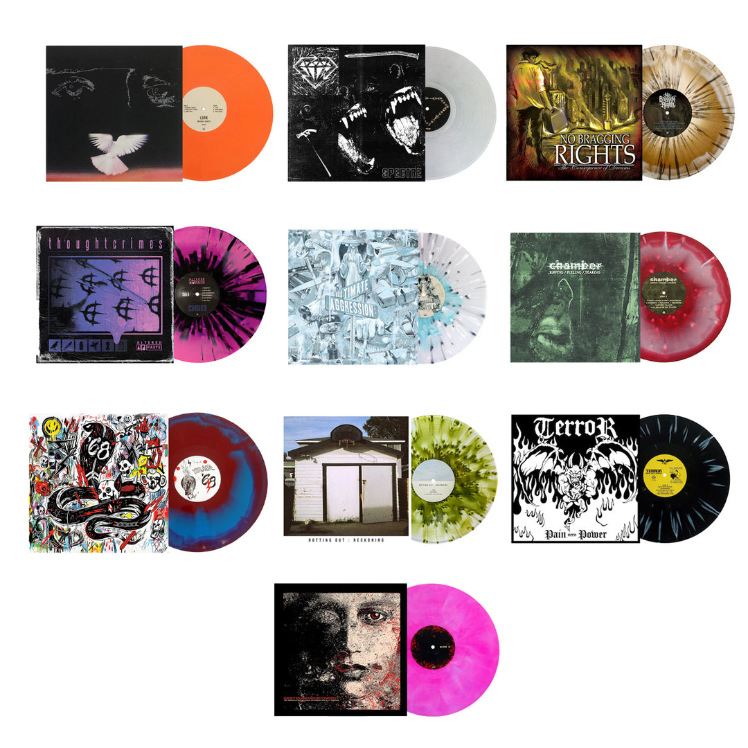 A grid of twelve limited edition vinyl records from Pure Noise Records Merch, each with unique album art and colorful splatter or solid designs, arranged in four rows by three columns on a white background.