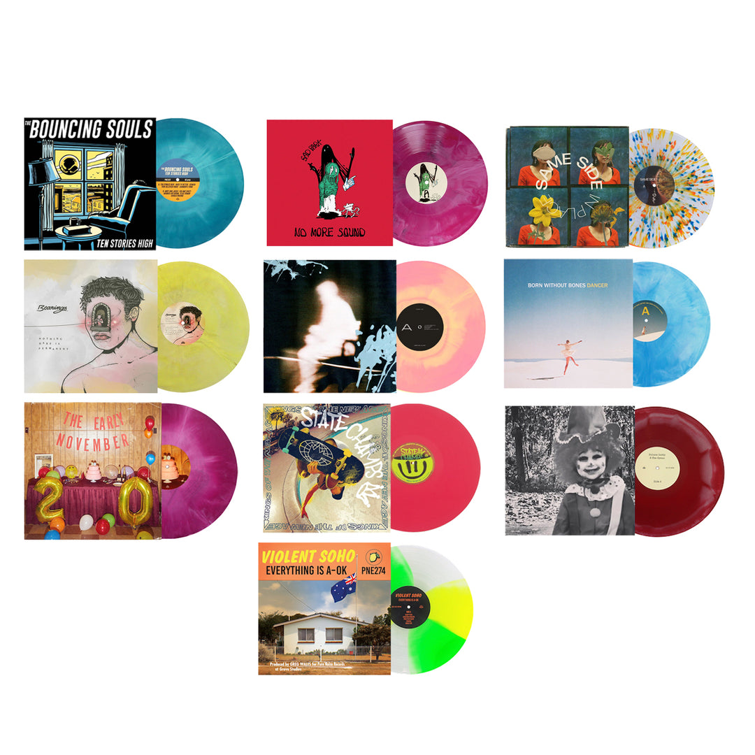 A grid of twelve limited edition vinyl records from Pure Noise Records Merch, each with unique album art and vibrant translucent or splatter-patterned discs in pink, yellow, blue, green, red, and purple.