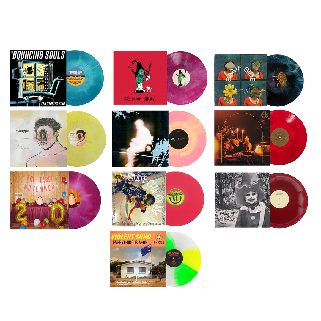 A grid of twelve Pure Noise Records Merch limited edition vinyl records with unique album art and vibrant red, pink, yellow, and green vinyl, arranged in three rows of four.