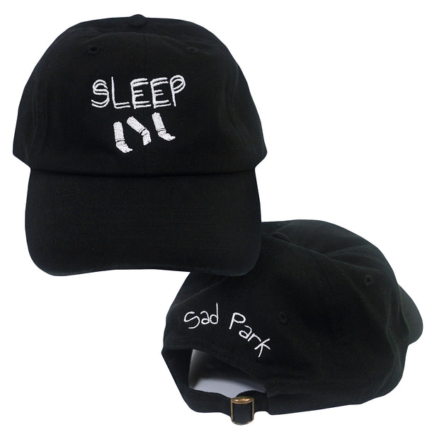 image of the front and back of Sad Park "Sleep" Black dad hat. front has the text Sleep over 3 cigarette butts. back of hat has the text Sad Park over the hole in the back. 