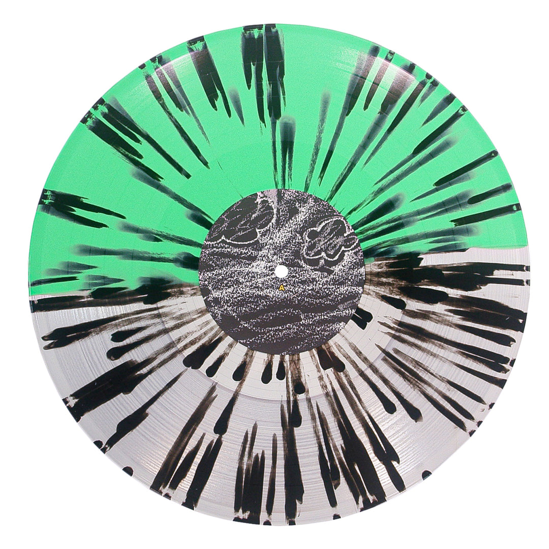 A Spite House Splatter Vinyl LP in green, black, and white 