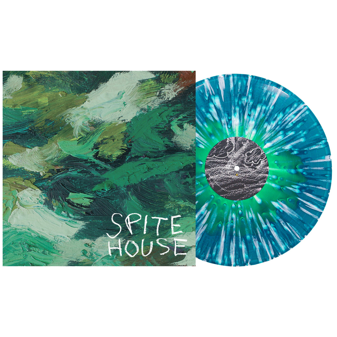 A green and white marbled Spite House vinyl LP lies beside its cover, featuring abstract green brushstrokes, handwritten “Spite House” text, and sea blue accents. Album releases September 2025.