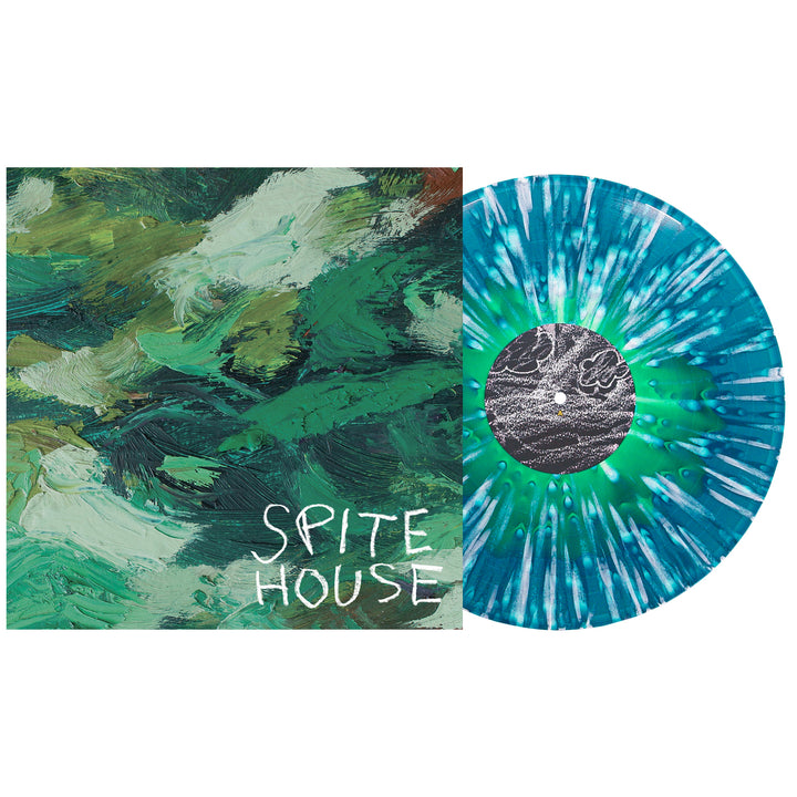 A green and white marbled Spite House vinyl LP lies beside its cover, featuring abstract green brushstrokes, handwritten “Spite House” text, and sea blue accents. Album releases September 2025.