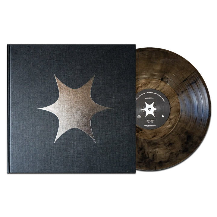 A black marbled brown Vinyl LP by The Story So Far is partially pulled from a matching black cover with a large metallic silver star emblem in the center, inspired by I Want To Disappear.