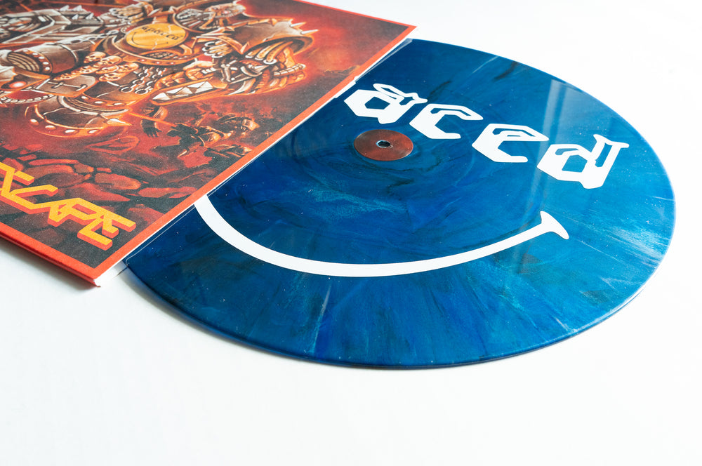 A blue Spaced "No Escape" vinyl with a white smiley face and partially visible "aced," beside a vibrant album cover in red and orange tones—ideal for fans excited about the presale.