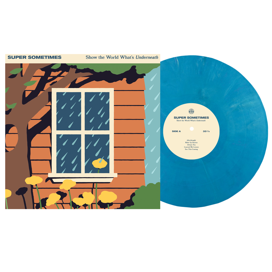 A blue vinyl record by Super Sometimes partially slides from its album cover, featuring an illustrated orange-wood house with rainy windows and yellow flowers. The album is titled "Show The World What’s Underneath.
